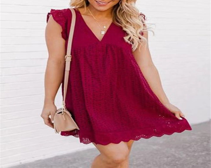 Damernas luftiga midiklänning med romantiska volangdetaljer Eva Jonsson-Eva Jonsson