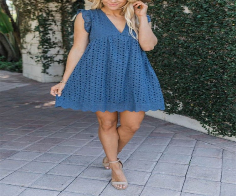 Damernas luftiga midiklänning med romantiska volangdetaljer Eva Jonsson-Eva Jonsson