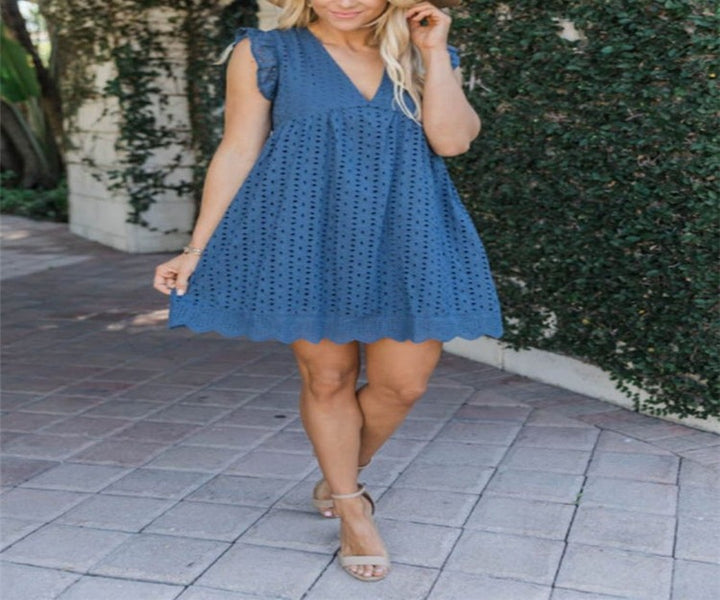 Damernas luftiga midiklänning med romantiska volangdetaljer Eva Jonsson-Eva Jonsson