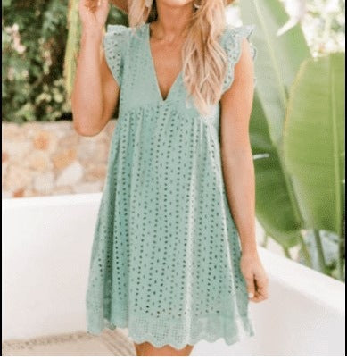 Damernas luftiga midiklänning med romantiska volangdetaljer Eva Jonsson-Eva Jonsson