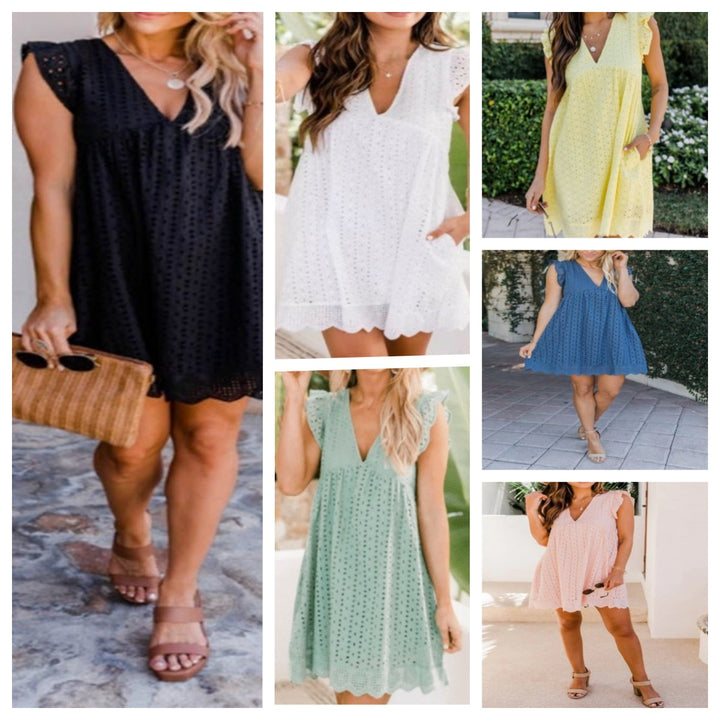 Damernas luftiga midiklänning med romantiska volangdetaljer Eva Jonsson-Eva Jonsson