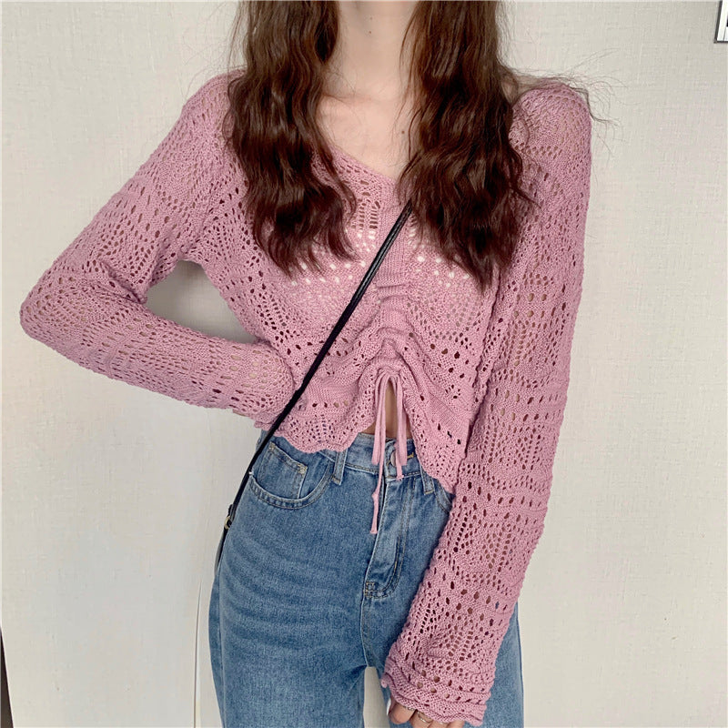 Damernas luftiga stickade pullover med drop shoulder-design och dragsko Mirla-Eva Jonsson