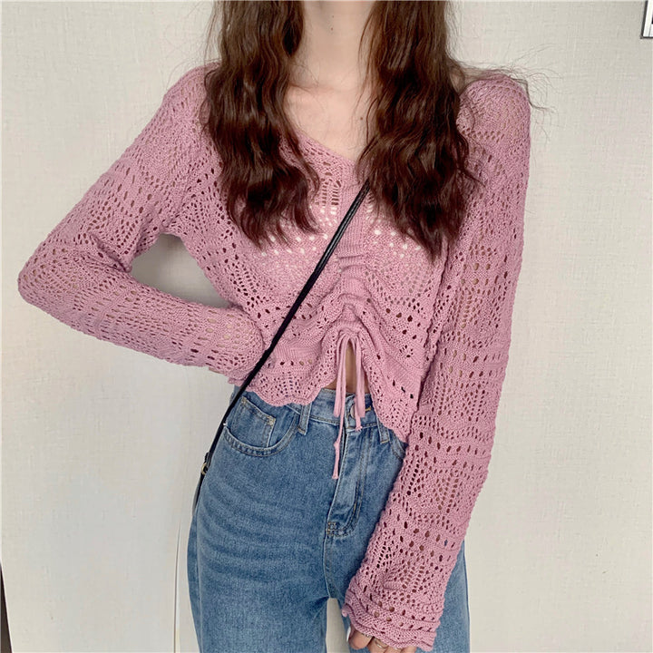 Damernas luftiga stickade pullover med drop shoulder-design och dragsko Mirla-Eva Jonsson