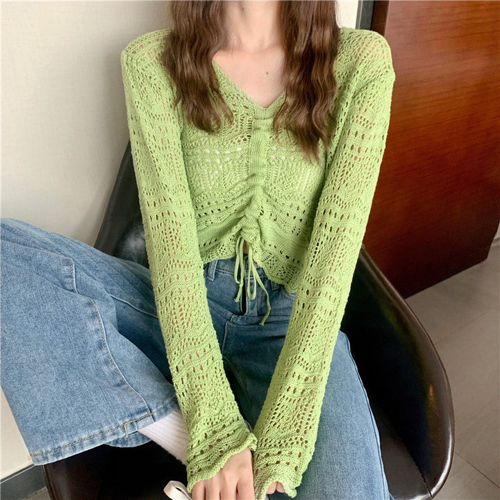 Damernas luftiga stickade pullover med drop shoulder-design och dragsko Mirla-Eva Jonsson