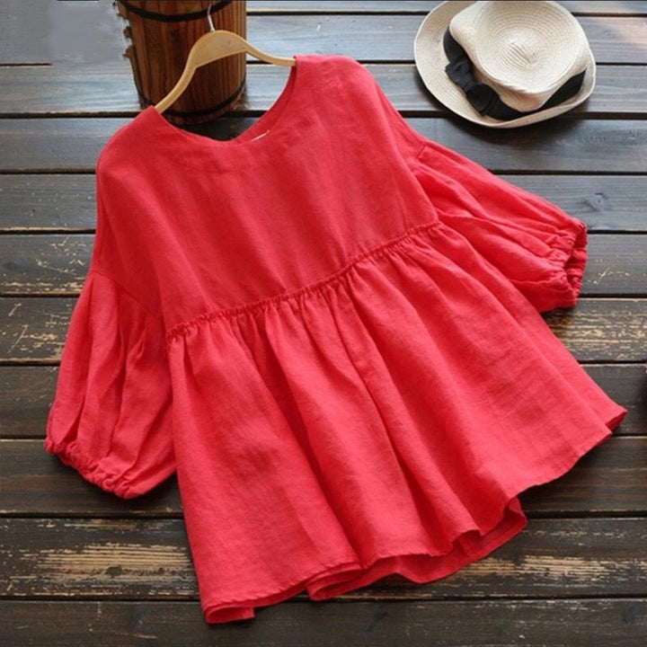 Damernas luftiga tunika med voluminösa ärmar och feminin silhuett Eva Jonsson-Eva Jonsson