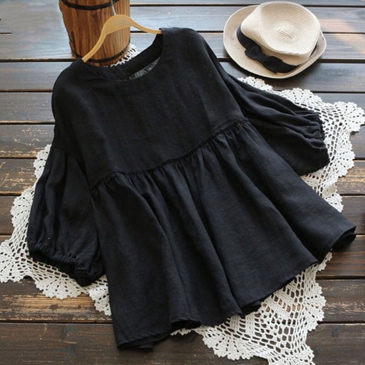 Damernas luftiga tunika med voluminösa ärmar och feminin silhuett Eva Jonsson-Eva Jonsson