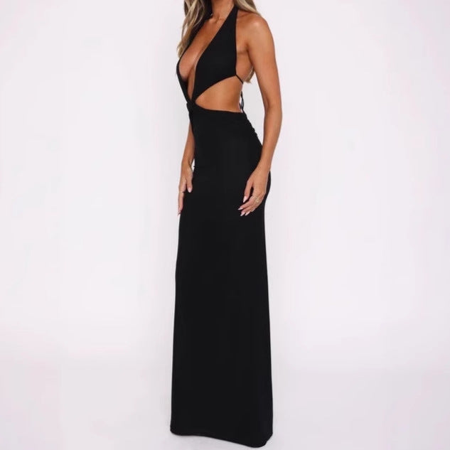 Damernas lyx maxiklänning med djup V-hals och spännande cut-out-detaljer Eva Jonsson-Eva Jonsson