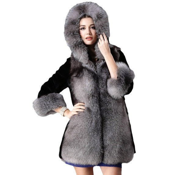 Damernas lyxiga konstpälsjacka med huva och dekorativa detaljer Eva Jonsson-Eva Jonsson