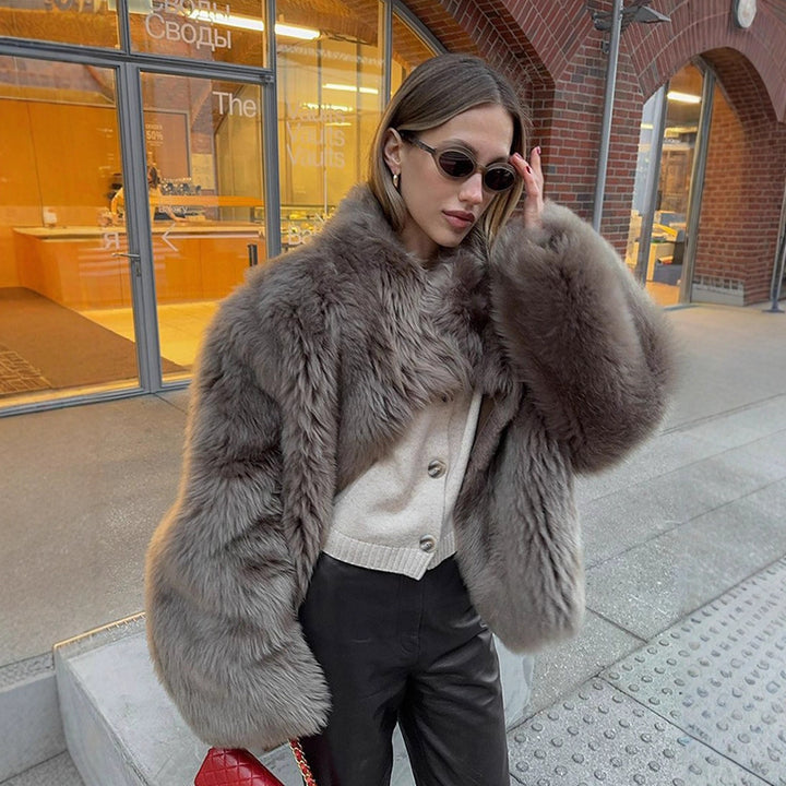 Damernas lyxiga konstpälsjacka med voluminösa ärmar Mirla-Eva Jonsson