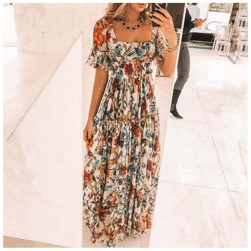 Damernas maxikjol med blommönster och utsvängda ärmar Eva Jonsson-Eva Jonsson
