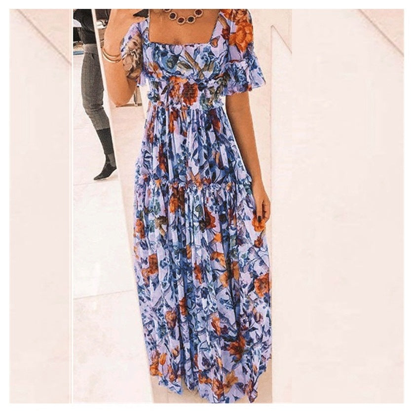 Damernas maxikjol med blommönster och utsvängda ärmar Eva Jonsson-Eva Jonsson