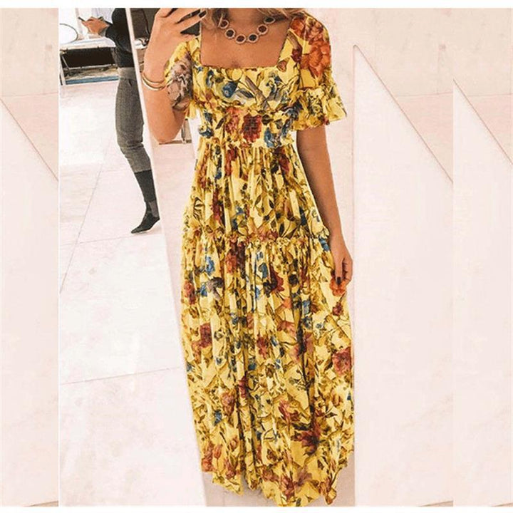 Damernas maxikjol med blommönster och utsvängda ärmar Eva Jonsson-Eva Jonsson
