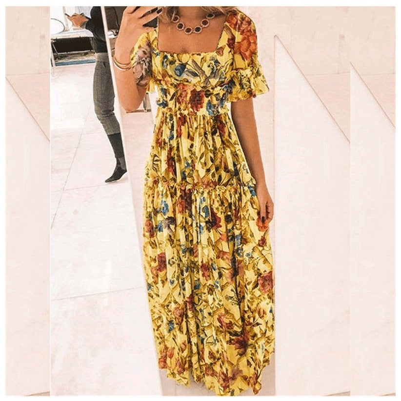 Damernas maxikjol med blommönster och utsvängda ärmar Eva Jonsson-Eva Jonsson