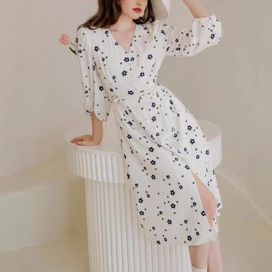 Damernas maxikjol med blomstertryck och eleganta puffärmar Eva Jonsson-Eva Jonsson