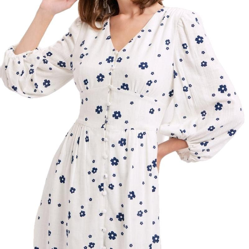 Damernas maxikjol med blomstertryck och eleganta puffärmar Eva Jonsson-Eva Jonsson