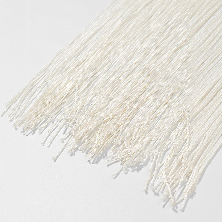 Damernas maxikjol med konstfull fransdekoration och elegant broderi Mirla-Eva Jonsson
