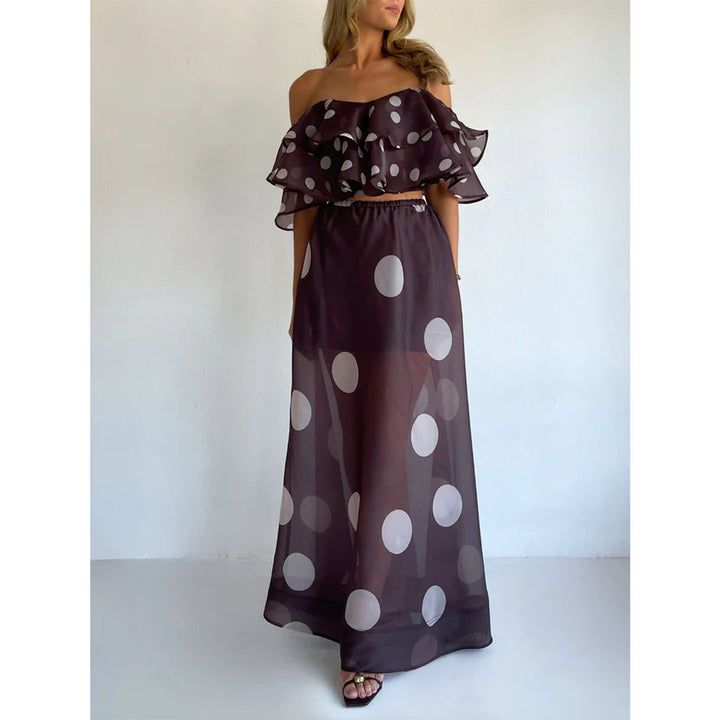 Damernas maxikjolset med off-shoulder topp och lekfullt ruffle design-Eva Jonsson
