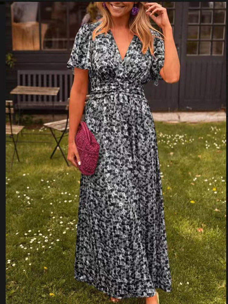 Damernas maxiklädning med floral rynkning och V-ringning Eva Jonsson-Eva Jonsson