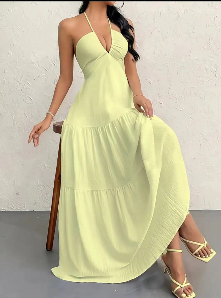 Damernas maxiklänning med axelbar design och avslappnade volangdetaljer Eva Jonsson-Eva Jonsson