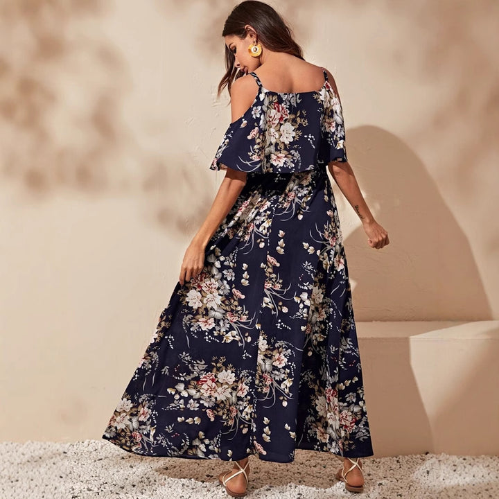 Damernas maxiklänning med axelbare design och blommönster Mirla-Eva Jonsson