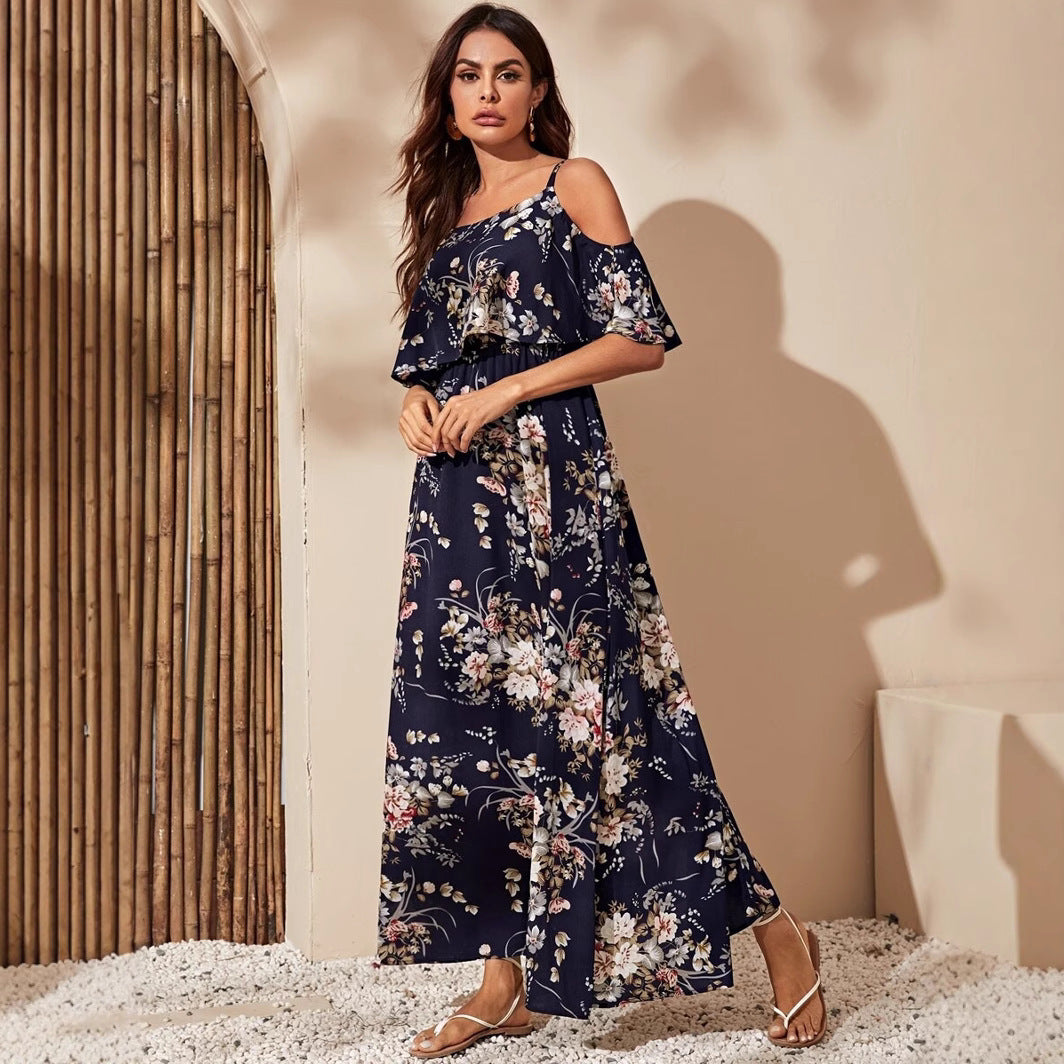 Damernas maxiklänning med axelbare design och blommönster Mirla-Eva Jonsson