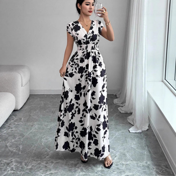 Damernas maxiklänning med blommönster Eva Jonsson-Eva Jonsson