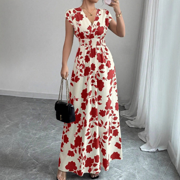 Damernas maxiklänning med blommönster Mirla-Eva Jonsson