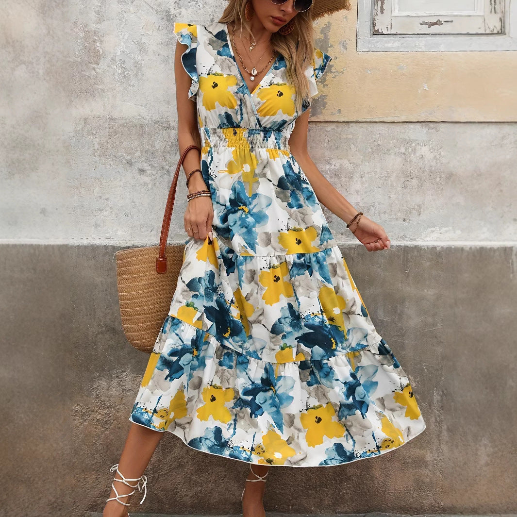 Damernas maxiklänning med blommönster och volangdetaljer Mirla-Eva Jonsson