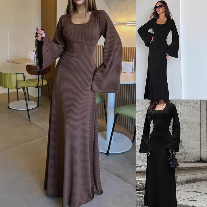 Damernas maxiklänning med breda utställda ärmar och eleganta detaljer Mirla-Eva Jonsson