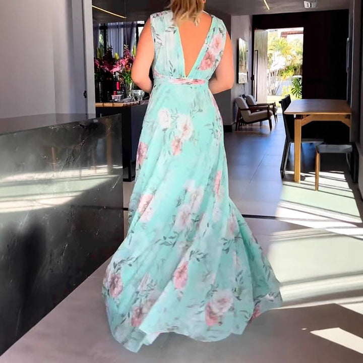 Damernas maxiklänning med flödande chiffong och romantisk blomstermaskinbroderi Mirla-Eva Jonsson