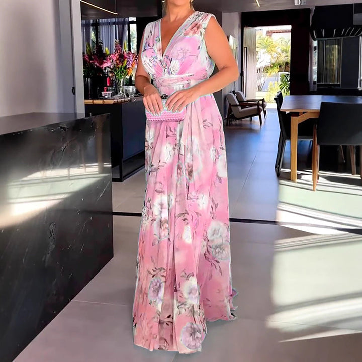 Damernas maxiklänning med flödande chiffong och romantisk blomstermaskinbroderi Mirla-Eva Jonsson