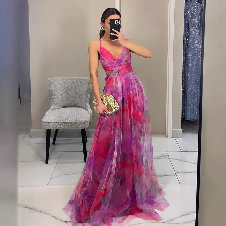 Damernas maxiklänning med konstfullt draperingsdesign och genomskinlig kjol Mirla-Eva Jonsson