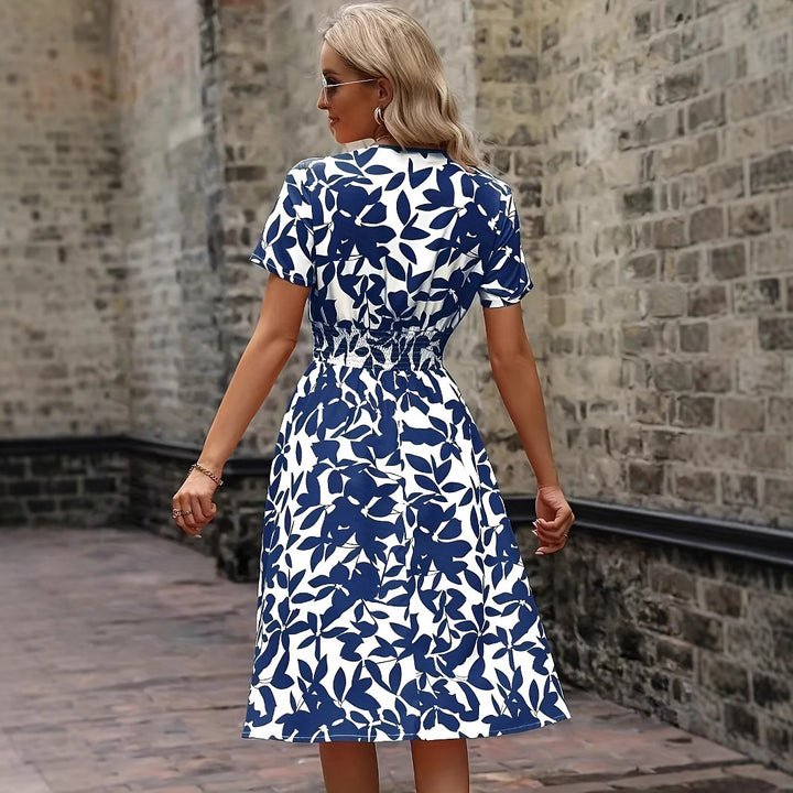 Damernas midi-wrap-klänning med blommönster och elastisk midja Eva Jonsson-Eva Jonsson