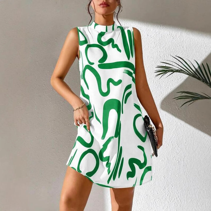 Damernas minimalistiska cocktailklänning med modernt grafiskt mönster Mirla-Eva Jonsson