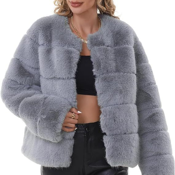 Damernas moda konstpälsjacka med iögonfallande snitt Eva Jonsson-Eva Jonsson