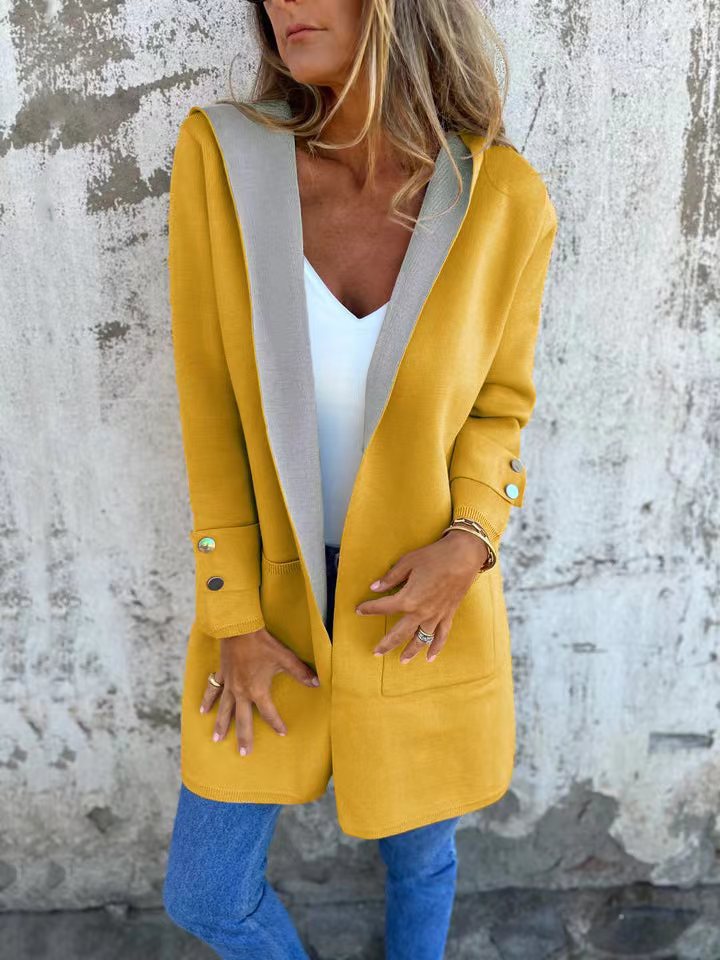 Damernas moda långjacka med generös huva och praktiska fickor Eva Jonsson-Eva Jonsson
