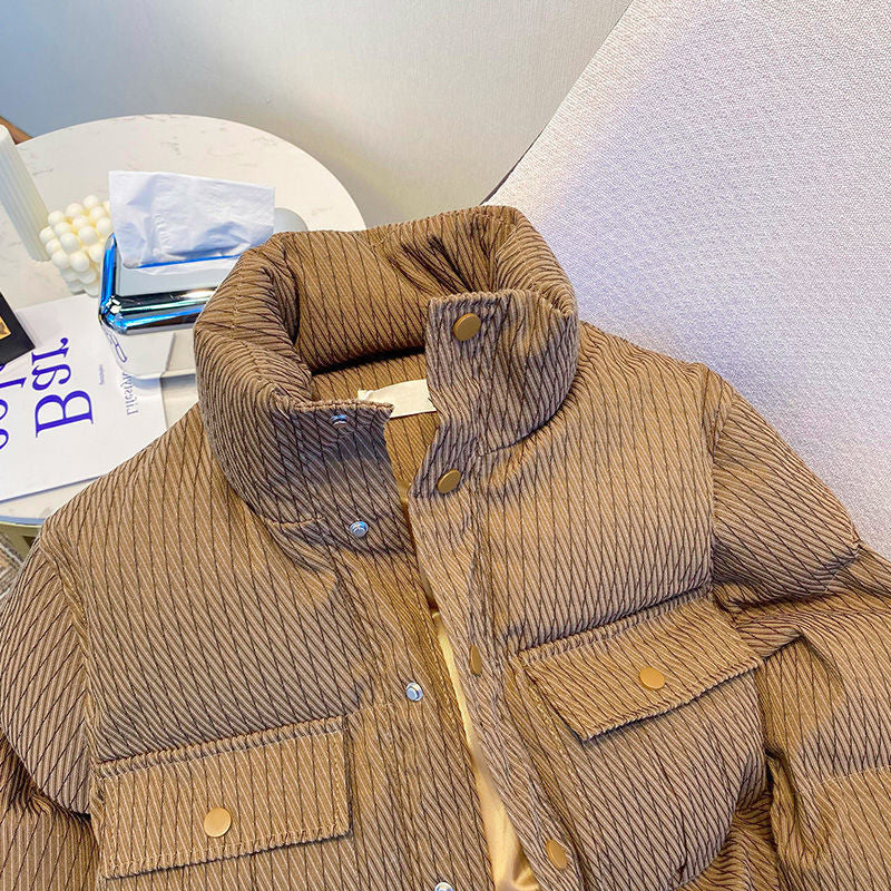 Damernas mode dunjacka med strukturerad design och praktiska fickor Mirla-Eva Jonsson