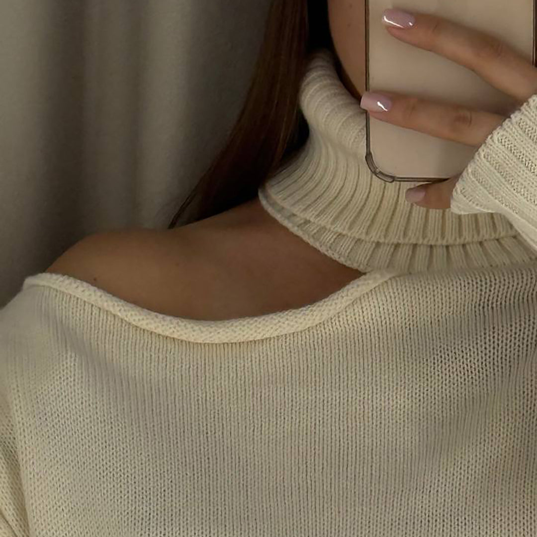 Damernas mode rullkrage tröja med asymmetrisk design Mirla-Eva Jonsson