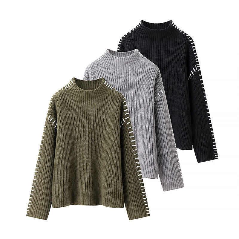 Damernas mode stickad tröja med hög krage och eleganta sidos detaljer Mirla-Eva Jonsson