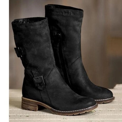 Damernas modeboots med sidodragkedja och dekorativa spännen Mirla-Eva Jonsson