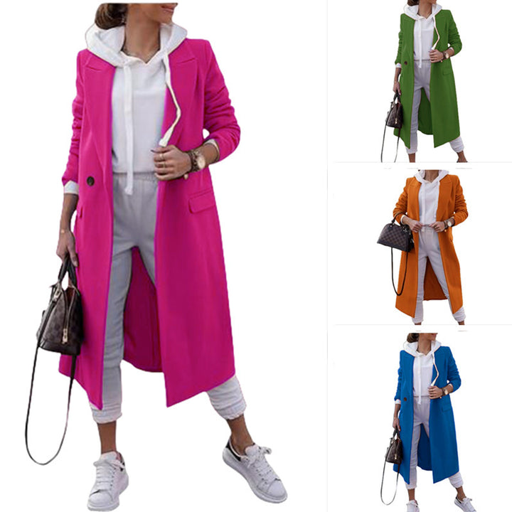 Damernas moderiktiga Oversize-kappa med elegant revers och praktiska fickor Mirla-Eva Jonsson