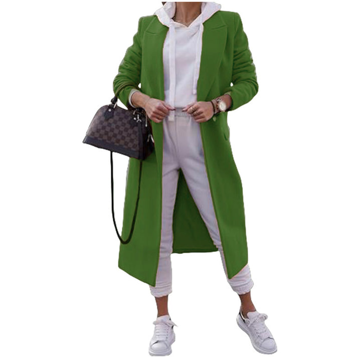 Damernas moderiktiga Oversize-kappa med elegant revers och praktiska fickor Mirla-Eva Jonsson