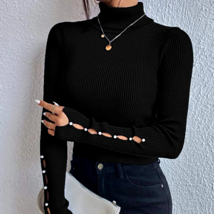 Damernas moderiktiga högkragig stickad topp med cut-out-detaljer Mirla-Eva Jonsson