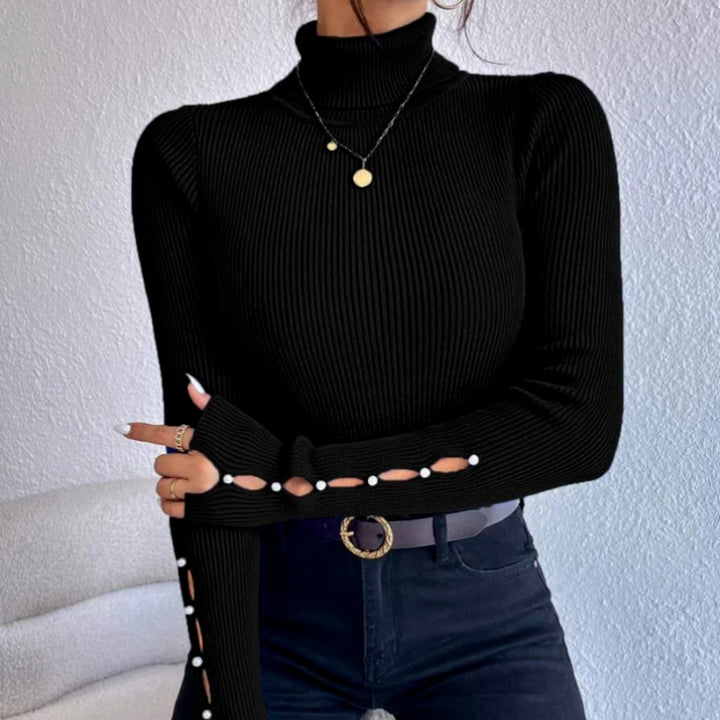Damernas moderiktiga högkragig stickad topp med cut-out-detaljer Mirla-Eva Jonsson
