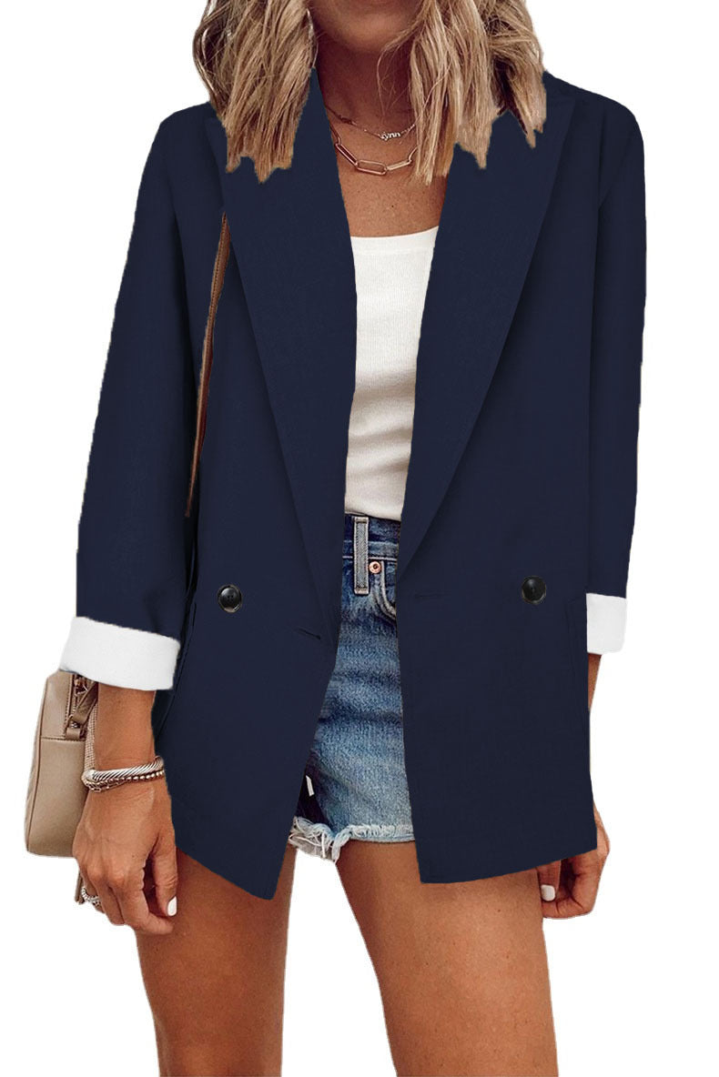 Damernas moderiktiga oversized blazer i enkel design med eleganta knappdetaljer Eva Jonsson-Eva Jonsson
