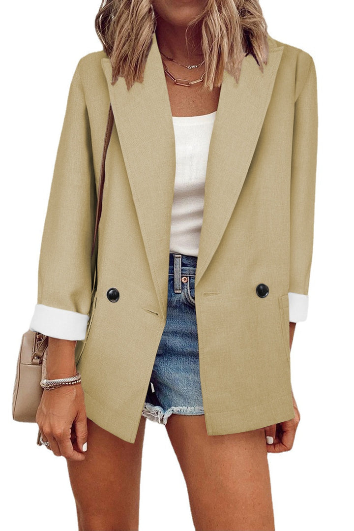 Damernas moderiktiga oversized blazer i enkel design med eleganta knappdetaljer Eva Jonsson-Eva Jonsson