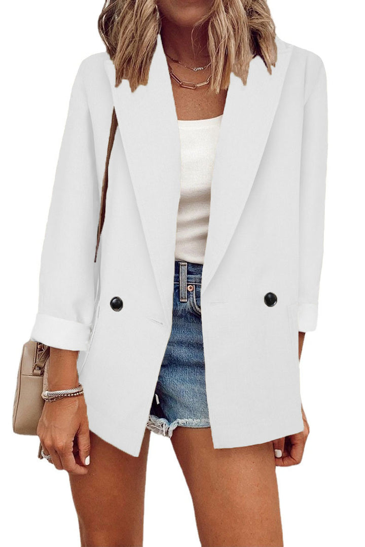 Damernas moderiktiga oversized blazer i enkel design med eleganta knappdetaljer Eva Jonsson-Eva Jonsson