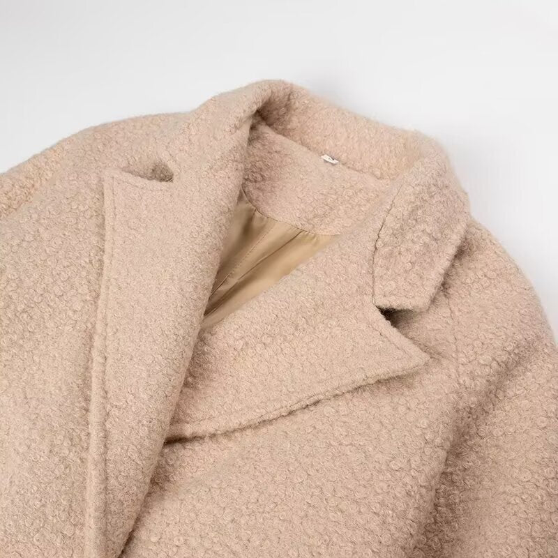 Damernas moderiktiga oversized ulljacka med midjebälte Mirla-Eva Jonsson