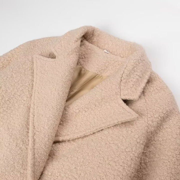 Damernas moderiktiga oversized ulljacka med midjebälte Mirla-Eva Jonsson