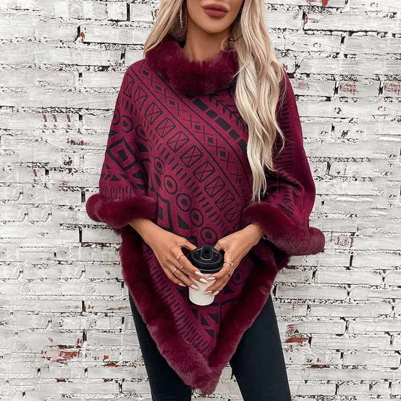 Damernas moderiktiga poncho med dekorativ krage av kunstpäls Mirla-Eva Jonsson